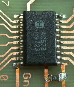 Soldering SMD by hand: attaching the two prepared corners of the chip.