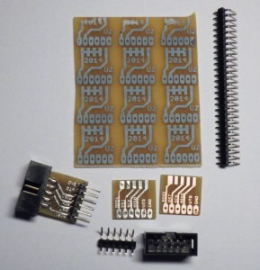 The adapter board at different stages of completion.