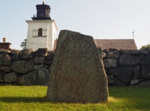 Runestone at Övergran church.