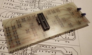 Rear side of the finished circuit board showing the socket for the microcontroller, the ISP port and the infrared LEDs.