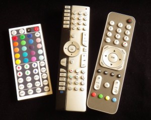 The three main remotes in my living room.